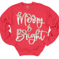 Merry and Bright sparkle script on red sweatshirt