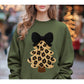 Leopard knit-look Christmas tree with black bow