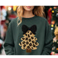 Leopard knit-look Christmas tree with black bow