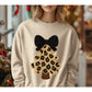 Leopard knit-look Christmas tree with black bow